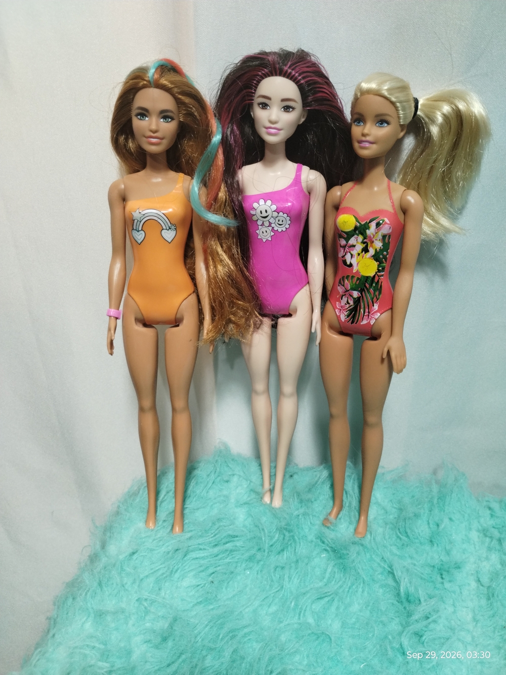Barbie Three-Piece Doll Set in Orange, Pink, and Coral Swimsuits
